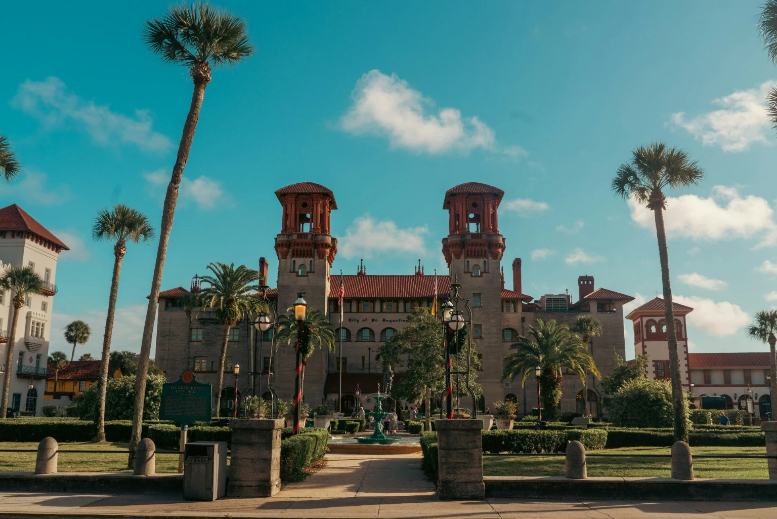 Historic St. Augustine architecture and palm-lined plaza area