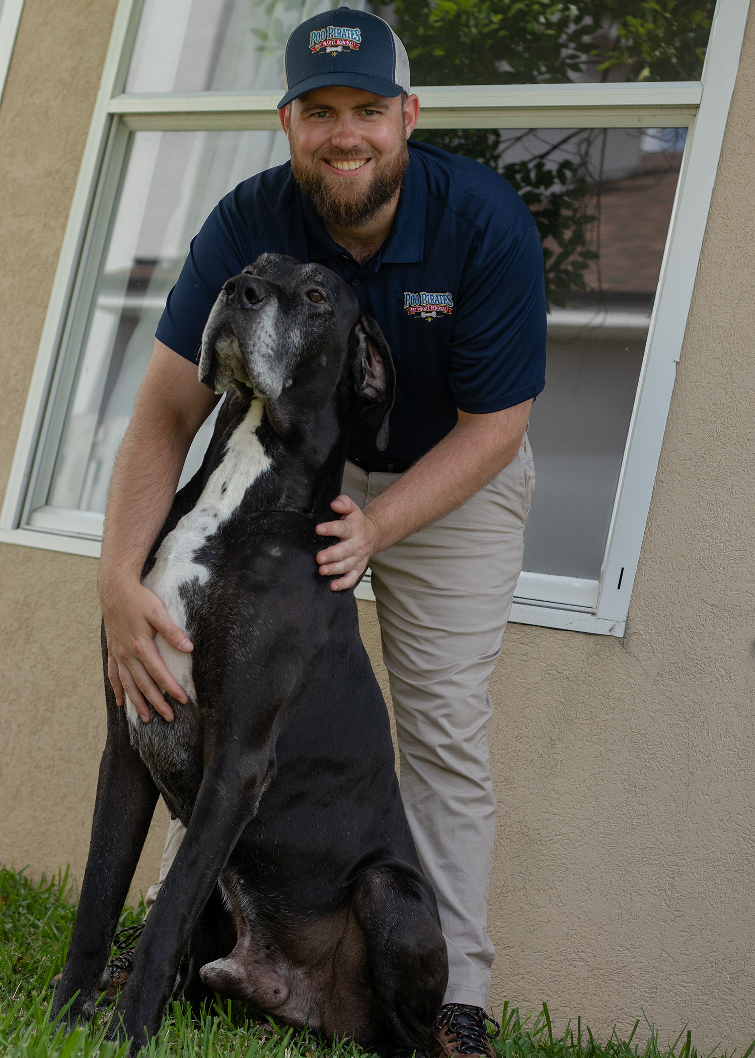 Will with a customer's Great Dane